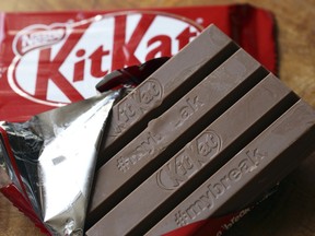 A Kitkat chocolate snack is photographed Wednesday July 25, 2018, in Rugby, England, after the European Court of Justice in Luxembourg ruled that the four-fingered shape of the KitKat chocolate bar is not distinctive enough to be trademarked.  KitKat maker Nestle, has been trying since 2002 to establish a European trademark for the snack.