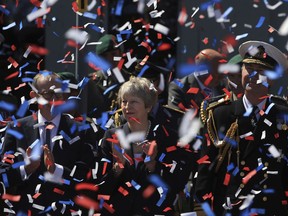 Britain's Prime Minister Theresa May during celebrations marking National Armed Forces Day in Llandudno, Wales, Saturday June 30, 2018.