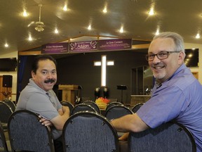 Pastors Jose Luis Gutierrez, left, from the Comunidad Cristiana Adulam church and Neil Amstutz from the Waterford Mennonite Church, pose for a portrait at Gutierrez's church on Friday, June 1, 2018. In late 2017, they invited clergy from around the county to Adulam and the group made plans for a community-wide service to oppose the immigration detention center.