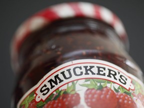 FILE - In this Aug. 16, 2010, file photo, a jar of Smucker's preserves is displayed in Philadelphia. J.M. Smucker is doing just about everything asked of it in trying to find areas of faster growth, while ditching some of the packaged foods that fewer people seemingly want. It's got a long way to go, however, and that may be what is being reflected Tuesday, July 10, 2018, as investors sell off shares of J.M. Smucker as well as other companies in the sector Tuesday.