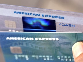 FILE - In this July 18, 2016, file photo, American Express credit cards are seen, in North Andover, Mass. American Express reports earnings Wednesday, July 18, 2018.