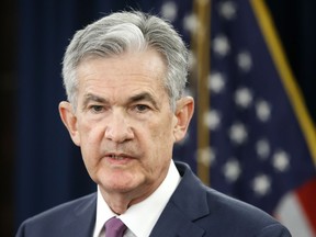 FILE- In this June 13, 2018, file photo, Federal Reserve Chair Jerome Powell speaks to the media after the Federal Open Market Committee meeting in Washington. The Federal Reserve says it expects low unemployment and rising inflation will keep it on track to raise interest rates at a gradual pace over the next two years. By late 2019, the Fed says its key policy rate should be at a level that will be slightly restrictive for growth.