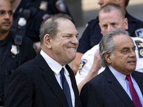 Harvey Weinstein, left, with his attorney Benjamin Brafman, right, leaves a Manhattan courthouse, Monday, July 9, 2018, in New York. Weinstein, who was previously indicted on charges involving two women, was released on bail on Monday while fighting sex crime accusations that now include a third woman.