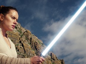 This image released by Lucasfilm shows Daisy Ridley as Rey in "Star Wars: The Last Jedi." Despite enthusiastic discourse around diversity in film, a report from the University of Southern California's Annenberg Inclusion Initiative says when it comes to the numbers, little has changed. In a survey of the top 100 films of 2017, 33 featured women in a lead or co-lead. And 31.8 percent of the speaking characters were female, a number that has stayed static for a decade. (Lucasfilm via AP)