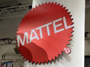 FILE - This April 26, 2018, file photo shows the Mattel logo at the TTPM 2018 Spring Showcase in New York. Mattel says it will cut 2,200 jobs as the maker of Barbie dolls and Hot Wheels cars tries to save money.