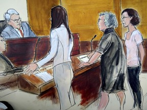 In this courtroom drawing, Clare Bronfman, right, is arraigned at federal court in New York, Tuesday, July 24, 2018. Bronfman, a daughter of the late billionaire philanthropist and former Seagram chairman Edgar Bronfman Sr., and three other people associated with the NXIVM organization were taken into custody and charged with racketeering conspiracy, the U.S. attorney's office in the Brooklyn borough of New York announced. From left is Judge Nicholas Garaufis, Assistant US Attorney Moira Penza, defense attorney Cassidy Necheles and Bronfman.