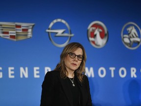 FILE- In this Jan. 10, 2017, file photo, General Motors Chairman and CEO Mary Barra speaks about the financial outlook of the automaker in Detroit. An escalating trade war and steep tariffs on steel and aluminum are putting pressure on earnings for automakers, prompting GM to slash its outlook while also weighing down shares of Ford Motor Co. and auto parts companies.