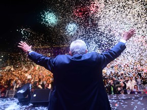 Newly elected Mexico's President Andres Manuel Lopez Obrador cheers his supporters after winning general elections in Mexico City on July 1, 2018.