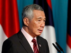 FILE - In this April 28, 2018, file photo, Singapore's Prime Minister Lee Hsien Loong speaks during a press conference to mark the end of the 32nd ASEAN Summit in Singapore. A cyberattack on Singapore's public health system breached records on 1.5 million people and targeted Prime Minister Lee, a two-time cancer survivor, officials said Friday, July 20, 2018.