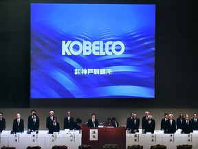 This June 21, 2018, image made from a TV screen shows the shareholders' meeting of Japan's steelmaker Kobe Steel in Kobe, western Japan.  Japanese prosecutors are charging the major steelmaker for falsifying data on a wide range of products. Tokyo prosecutors said Thursday, July 19, 2018,  that Kobe Steel is being charged with violating laws overseeing fair competition.  (Kyodo News via AP)
