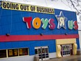 A "Going Out Of Business" hangs on display outside a Toys R Us Inc. retail store in Frederick, Maryland, in April.