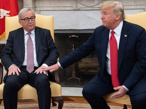 U.S. President Donald Trump meets with European Commission President Jean-Claude Juncker in the Oval Office of the White House in Washington, DC, on Wednesday.