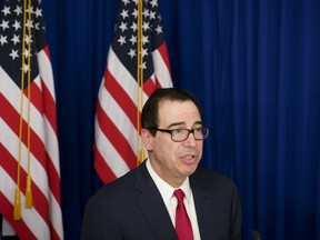 U.S. Treasury Secretary Steven Mnuchin speaks during a press gaggle with reporters in Buenos Aires, Argentina, Saturday, July 21, 2018. Mnuchin said Saturday that Donald Trump was not trying to put pressure on the Federal Reserve when he criticized its decision to raise interest rates.