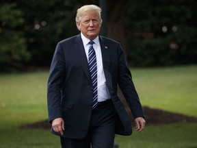 In this July 23, 2018, photo, President Donald Trump arrives for a tour during a "Made in America Product Showcase" at the White House in Washington. A new report by the Washington-based watchdog group Public Citizen found that while Trump has positioned himself as a tough, "law and order" president, he has mostly excluded one group of offenders from his sights: those of the corporate class.