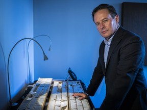 Mark Selby, CEO of Royal Nickel Corp., looks at drill core samples in his Toronto office.
