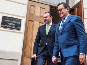 Mexican Foreign Minister Luis Videgaray, left, and Mexico's Secretary of Economy Ildefonso Guajardo leave after a day of NAFTA meetings in Washington.