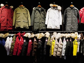 Canada Goose Inc coats hang in the show room of a manufacturing facility in Toronto.