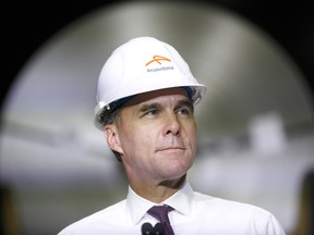 Bill Morneau, Canada's minister of finance, pauses while speaking at the ArcelorMittal Dofasco Inc. steel galvanizing mill in Hamilton.