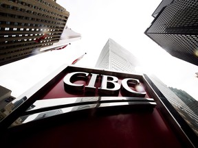 CIBC raised its quarterly dividend as it reported a third-quarter profit of $1.37 billion.