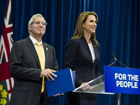 Ontario's Minister of Finance Vic Fideli and Attorney General Caroline Mulroney deliver remarks following an announcement on Ontario's cannabis retail model, in Toronto on Monday, August 13, 2018.