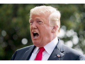 Canada's forestry industry is pushing back against comments by U.S. President Trump that lumber imports are partially to blame for intense forest fires in California. President Donald Trump speaks to members of the media before boarding Marine One on the South Lawn at the White House in Washington, Friday, Aug. 17, 2018, for a short trip to Andrews Air Force Base, Md., and then on to Southampton, N.Y., for a fundraiser.