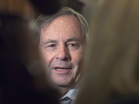 David MacNaughton, Canada's ambassador to the United States, talks with reporters before the morning session as the Liberal cabinet meets in St. John's, N.L. on Tuesday, Sept. 12, 2017. MacNaughton says predictions that NAFTA talks can be settled by the end of month are aspirational ??? even if American and Mexican officials were to reach an agreement today on complex auto sector issues.