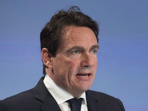 Quebecor President and CEO Pierre Karl Peladeau speaks at the company's annual general meeting in Montreal on May 11, 2017. Pierre Karl Peladeau is challenging the penalty levied against him after he pleaded guilty to violating Quebec election law in connection with his 2015 Parti Quebecois leadership bid. The president of Quebecor Inc. used personal funds to pay debts of roughly $135,000 he amassed during his successful leadership campaign.