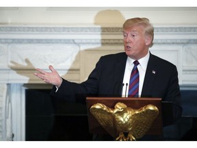 President Donald Trump speaks during a dinner for evangelical leaders in the State Dining Room of the White House, Monday, Aug. 27, 2018, in Washington.