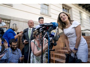 Canadian Foreign Affairs Minister Chrystia Freeland speaks to members of the media as she arrives at the Office Of The United States Trade Representative, Tuesday, Aug. 28, 2018, in Washington. Canada, America's longtime ally and No. 2 trading partner, was left out of a proposed deal Trump just reached with Mexico and is scrambling to keep its place in the regional free-trade bloc -- and fend off the threat of U.S. taxes on its vehicles.