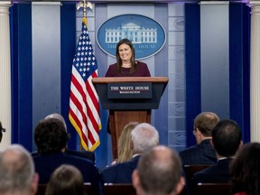 White House press secretary Sarah Huckabee Sanders smiles as she speaks to the media during the daily press briefing at the White House, Tuesday, Aug. 14, 2018, in Washington. Sanders took questions about former White House staffer Omarosa Manigault and other topics.