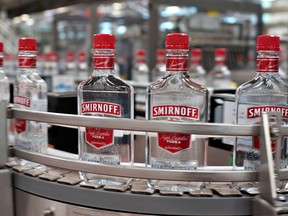 Bottles of Smirnoff vodka travel through a bottling line at the Diageo North America bottling facility in Plainfield, Illinois, U.S. Canada’s legalization of recreational pot, which begins in October, has attracted broad interest from the drinks industry.