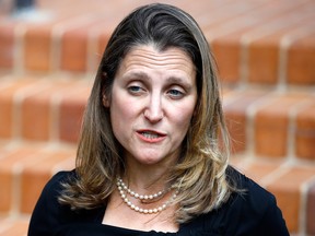 Canada's Foreign Affairs Minister Chrystia Freeland speaks to the media during a break at the Office of the United States Trade Representative, Wednesday, Aug. 29, 2018, during trade talks in Washington.