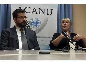 Peter Asaro, left, of the International Committee for Robot Arms Control, and Jody Williams of the Nobel Women's Initiative speak to reporters at a news conference in Geneva, Switzerland, Monday, Aug. 27, 2018. Experts from scores of countries are meeting to discuss ways to define and deal with "killer robots", futuristic weapons systems that could conduct war without human intervention.