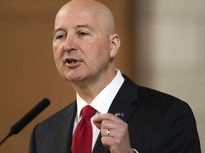 FILE - In this April 18, 2018, file photo, Nebraska Gov. Pete Ricketts speaks at the legislature, in Lincoln, Neb. Three years after Nebraska lawmakers voted to abolish capital punishment, the state is preparing to carry out its first execution since 1997 on Tuesday, Aug. 14, 2018, in an about-face driven largely by Republican Gov. Pete Ricketts who helped finance a ballot drive to reinstate the punishment after lawmakers overrode his veto and abolished the punishment in 2015.