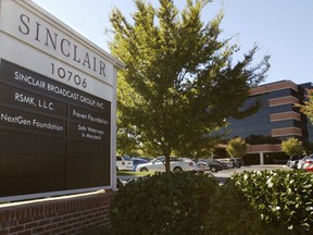 FILE - This Oct. 12, 2004 file photo shows Sinclair Broadcast Group, Inc.'s headquarters in Hunt Valley, Md.  Tribune Media is ending its $3.9 billion deal with Sinclair Broadcast, and has filed a lawsuit against Sinclair for breach of contract. Sinclair had offered to buy Tribune's 42 TV stations. The two companies had until midnight Wednesday, Aug. 8, 2018 to call the deal off and have been facing tough regulatory challenges.