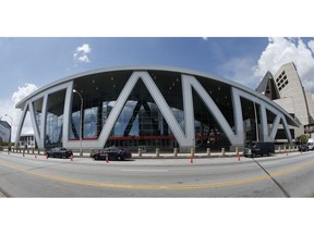 FILE - This July 6, 2017, file photo shows Philips Arena, home of the Atlanta Hawks NBA basketball team, in Atlanta. Philips Arena in Atlanta is being renamed for State Farm after a $192.5 million renovation. The Atlanta Hawks and the insurance company announced Wednesday, Aug. 29, 2018, they have reached a 20-year deal on the naming rights for the arena, which is currently in the final phase of its renovation. The arena is expected to reopen in October.