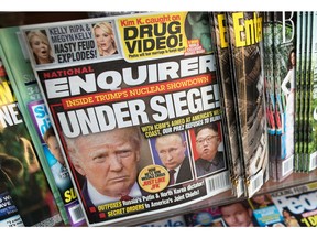 FILE - This July 12, 2017, file photo shows the cover of an issue of the National Enquirer featuring President Donald Trump at a store in New York. Confidential documents obtained by The Associated Press show that the National Enquirer's circulation declined even as it published stories attacking Trump's political foes and, prosecutors claim, helped suppress stories about his alleged sexual affairs.
