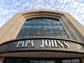 FILE - This July 17, 2018, file photo, shows the corporate headquarters of Papa John's pizza located on their campus, in Louisville, Ky. Papa John's Pizza reports earnings Tuesday, Aug. 7.
