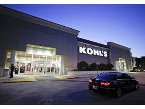 FILE - In this Aug. 22, 2017, file photo, a car drives by the entrance of a Kohl's department store in Orlando, Fla. Kohl's Corp. reports earnings Tuesday, Aug. 21, 2018.