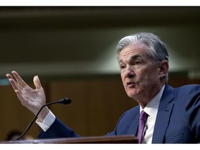 FILE- In this July 17, 2018, file photo Federal Reserve Board Chair Jerome Powell testifies before the Senate Committee on Banking, Housing, and Urban Affairs at Capitol Hill in Washington. Powell gives the keynote address Friday, Aug. 24, at an annual conference of central bankers in Jackson Hole, Wyo.