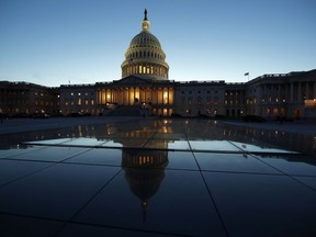 FILE- This March 5, 2018, file photo show the East Front of the U.S. Capitol at sunset in Washington. On Friday, Aug. 10, the Treasury Department releases federal budget data for July.