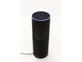 FILE - In this June 14, 2018, file photo, an Amazon Echo is displayed in New York. Digital assistants like the Echo don't always understand questions or serve up useful answers, which some parents say is a good thing. But these in-house virtual visitors do create challenges and opportunities for parents, especially those raising younger kids.
