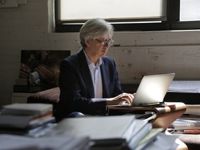 In this Wednesday, Aug. 8, 2018, photo Dash Design's founder David Ashen works in his office in New York. When five out of 22 staffers left Dash Design last year, owner Ashen understood that some naturally wanted to move on to a new challenge. But he also discovered after talking to employees that they felt the culture in his New York-based interior design company had changed since he brought in a new business partner. Ashen sought help from a team-building expert to help employees feel more connected to the business, and he focused on mentoring younger staffers.