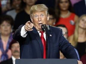 President Donald Trump speaks during a rally, Saturday, Aug. 4, 2018, in Lewis Center, Ohio.