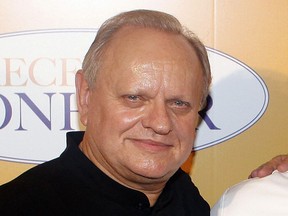 FILE - In this Sept.7, 2014 file photo, French chef Joel Robuchon poses for photographers during a photocall for the movie "The Hundred-Foot Journey", in Paris, Sunday, Sept. 7, 2014. French master chef Joel Robuchon has died at the age of 73.