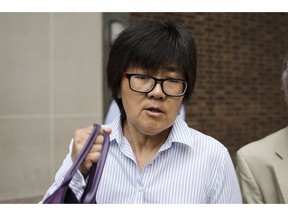 Yu Xue exits the federal courthouse in Philadelphia, Friday, Aug. 31, 2018. Xue, a cancer researcher, pleaded guilty to conspiring to steal biopharmaceutical trade secrets from GlaxoSmithKline in what prosecutors said was a scheme to set up companies in China to market them.