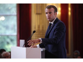 French President Emmanuel Macron delivers a speech during the annual French ambassadors' conference at the Elysee Palace in Paris, France, Monday, Aug. 27, 2018.