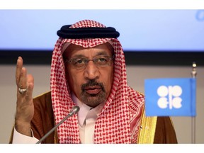 FILE - In this June 23, 2018 file photo, Saudi Energy Minister Khalid al-Falih attends a news conference in Vienna, Austria. Saudi Arabia said on Thursday, Aug. 23, 2018 that it "remains committed" to an initial public offering of the state-run oil behemoth Saudi Aramco despite delays and growing speculation it may never be listed.