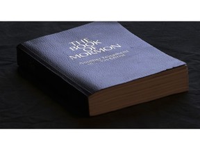 The Book of Mormon is shown Tuesday, Aug. 21, 2018, Salt Lake City. Sheraton, Westin and other Starwood hotels are finding their religion. Marriott International, which bought Starwood two years ago, has begun putting copies of the Bible and the Book of Mormon in Sheratons, Westins and other hotels in the Starwood family.