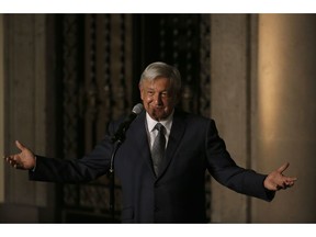 FILE - In this  Aug. 9, 2018 file photo, Mexico's President-elect Andres Manuel Lopez Obrador speaks to reporters after meeting with Mexico's President Enrique Pena Nieto at the National Palace in Mexico City. Lopez Obrador has thanked U.S. President Donald Trump on Friday, Aug. 25, for treating Mexicans with more respect, or at least not saying anything insulting lately.